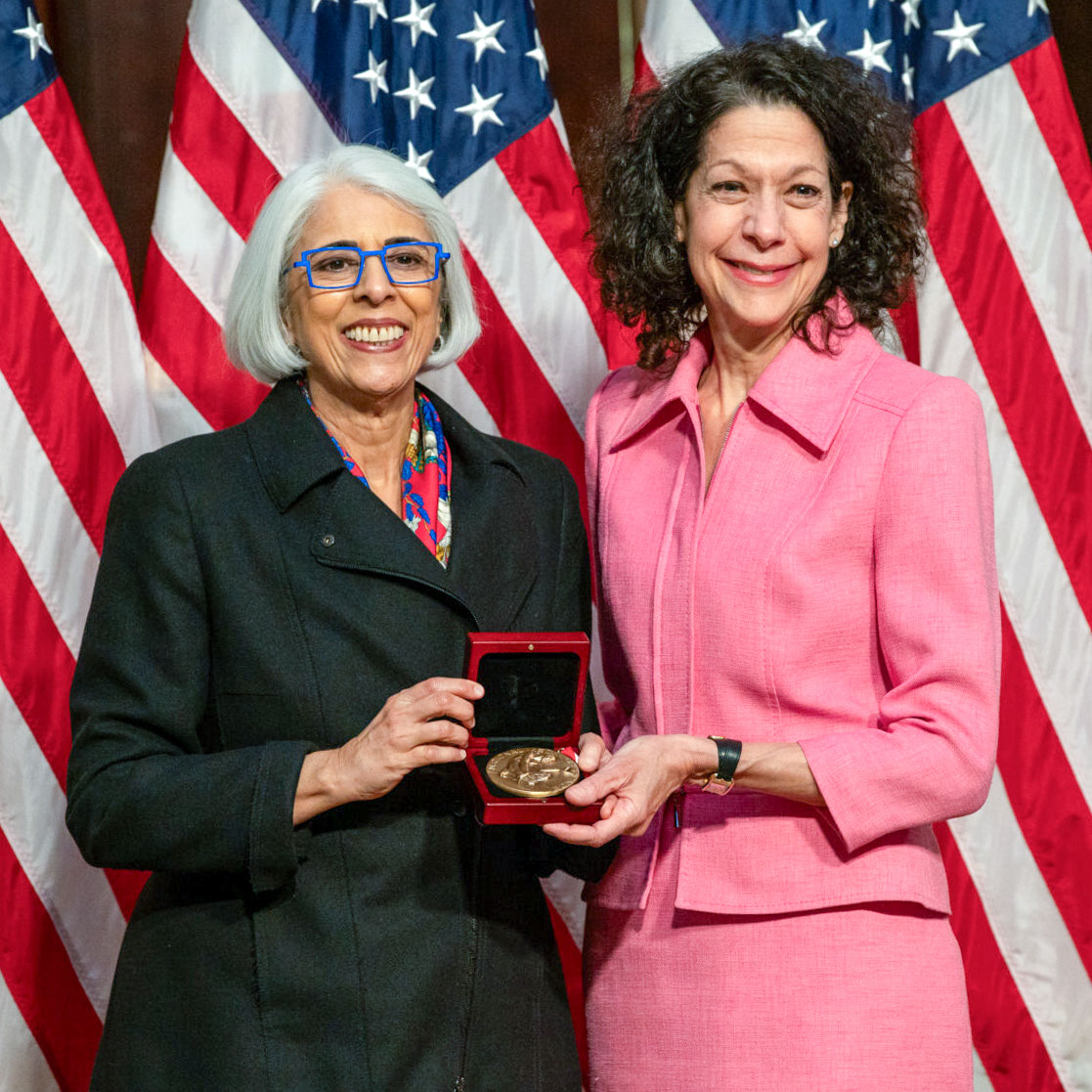 Bonnie Bassler receiving the National Medal of Science.