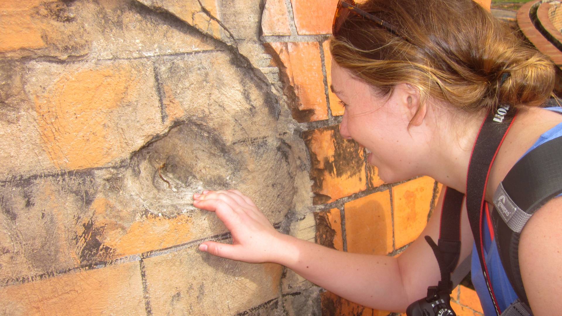 Isabella Douglas looking at reinforced concrete in Cuba