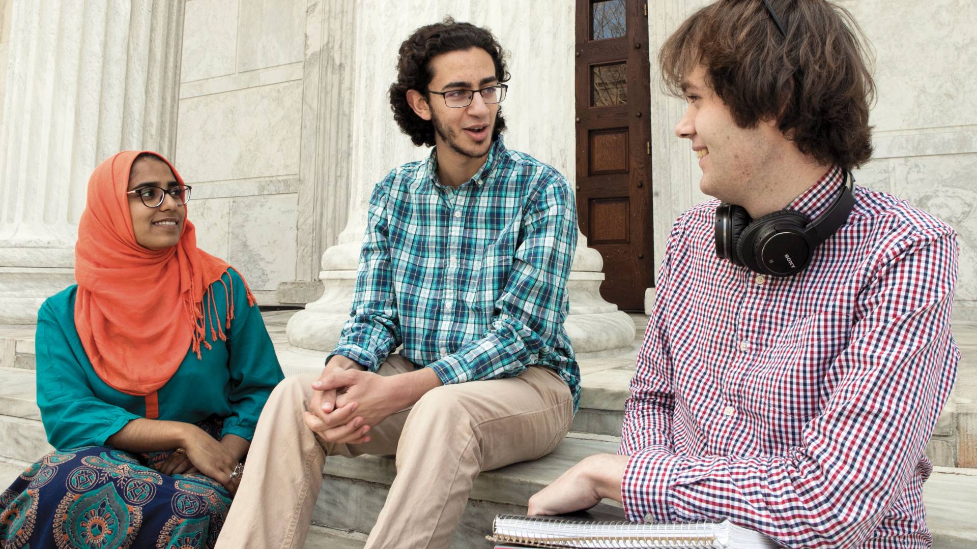 Yousef Elzalabany sitting on steps of Clio Hall