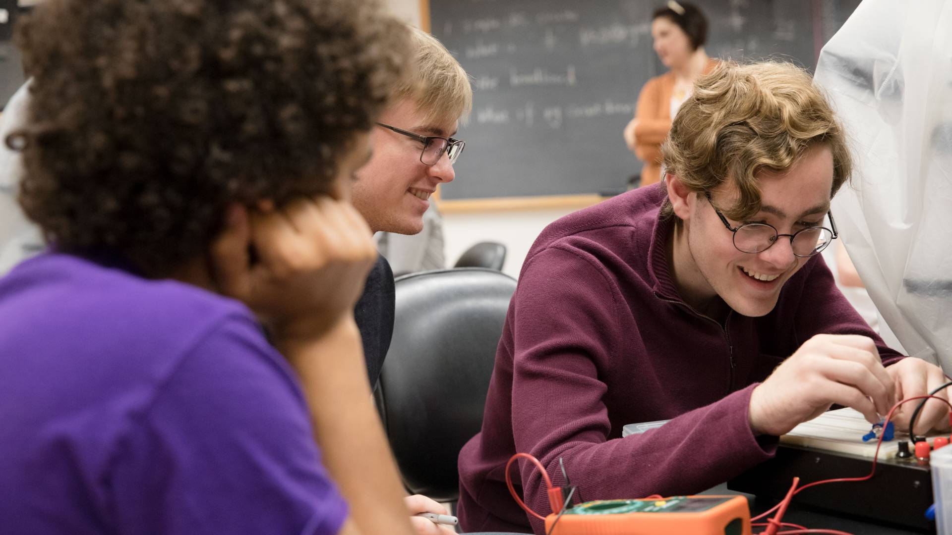 Students working on circuit boards