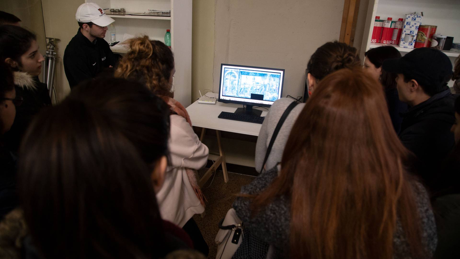 Students looking at artwork being restored in Venice