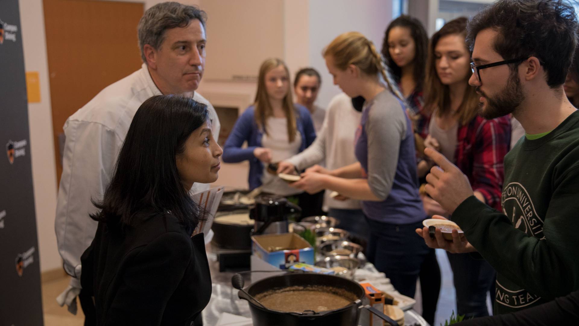 Student talking to Smitha Haneef