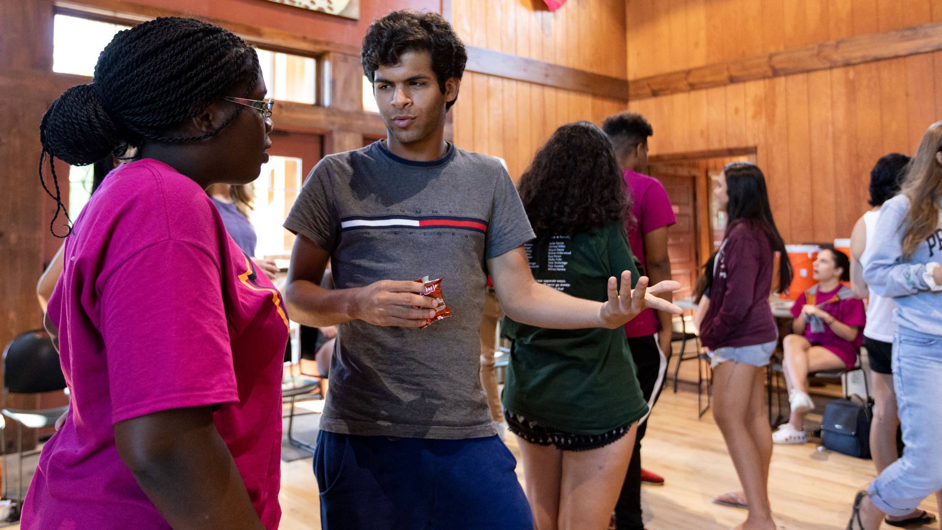 Anika Duffus (left) talks with Musab Almajnouni