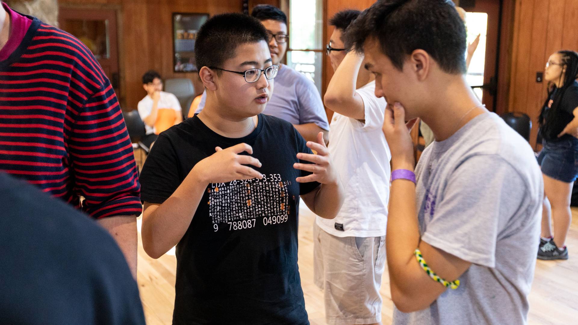 Hanzhang Ren (left) speaking with Hunter Worth