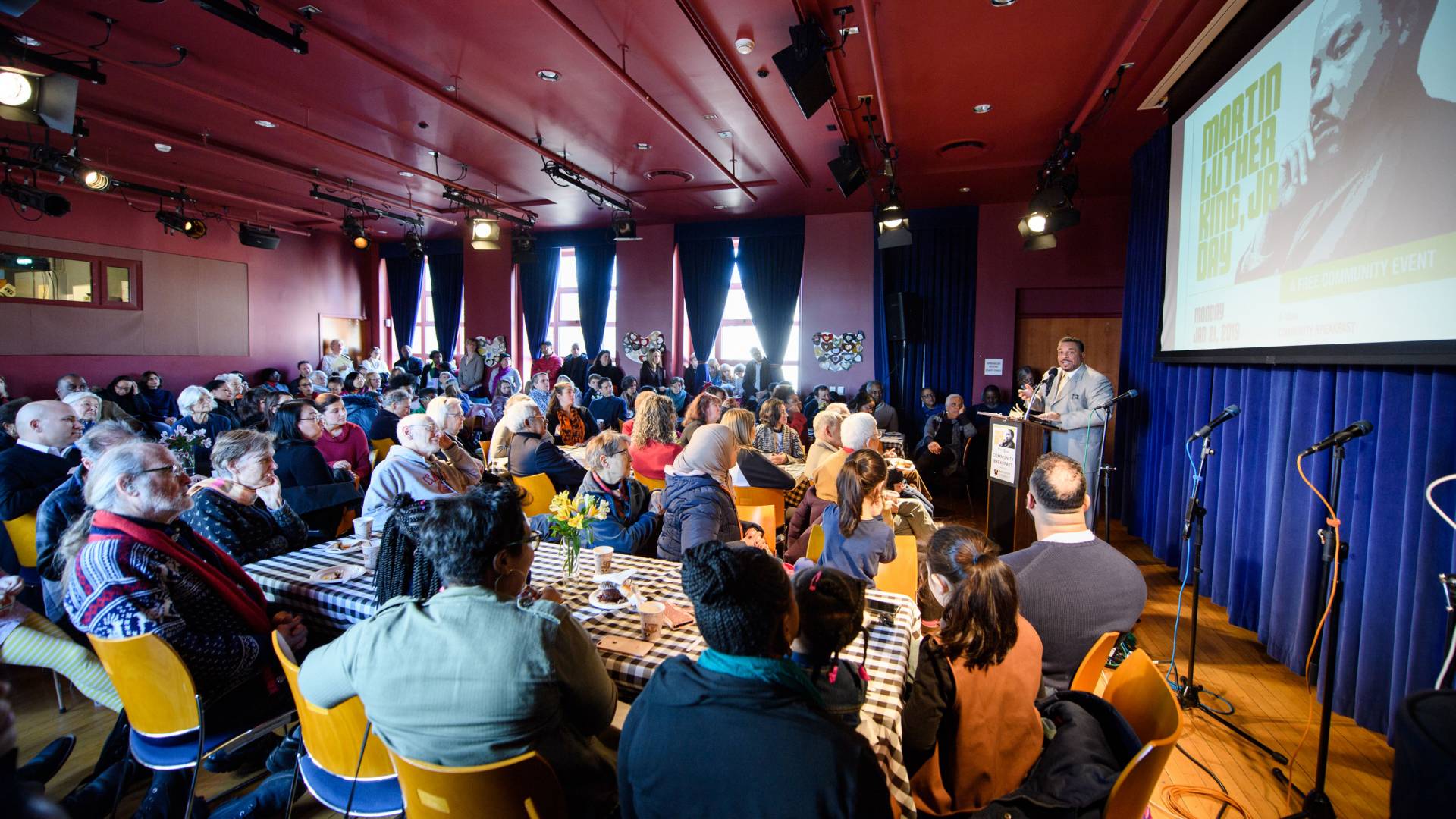 Rev. Lukata Mjumbe speaks to crowd