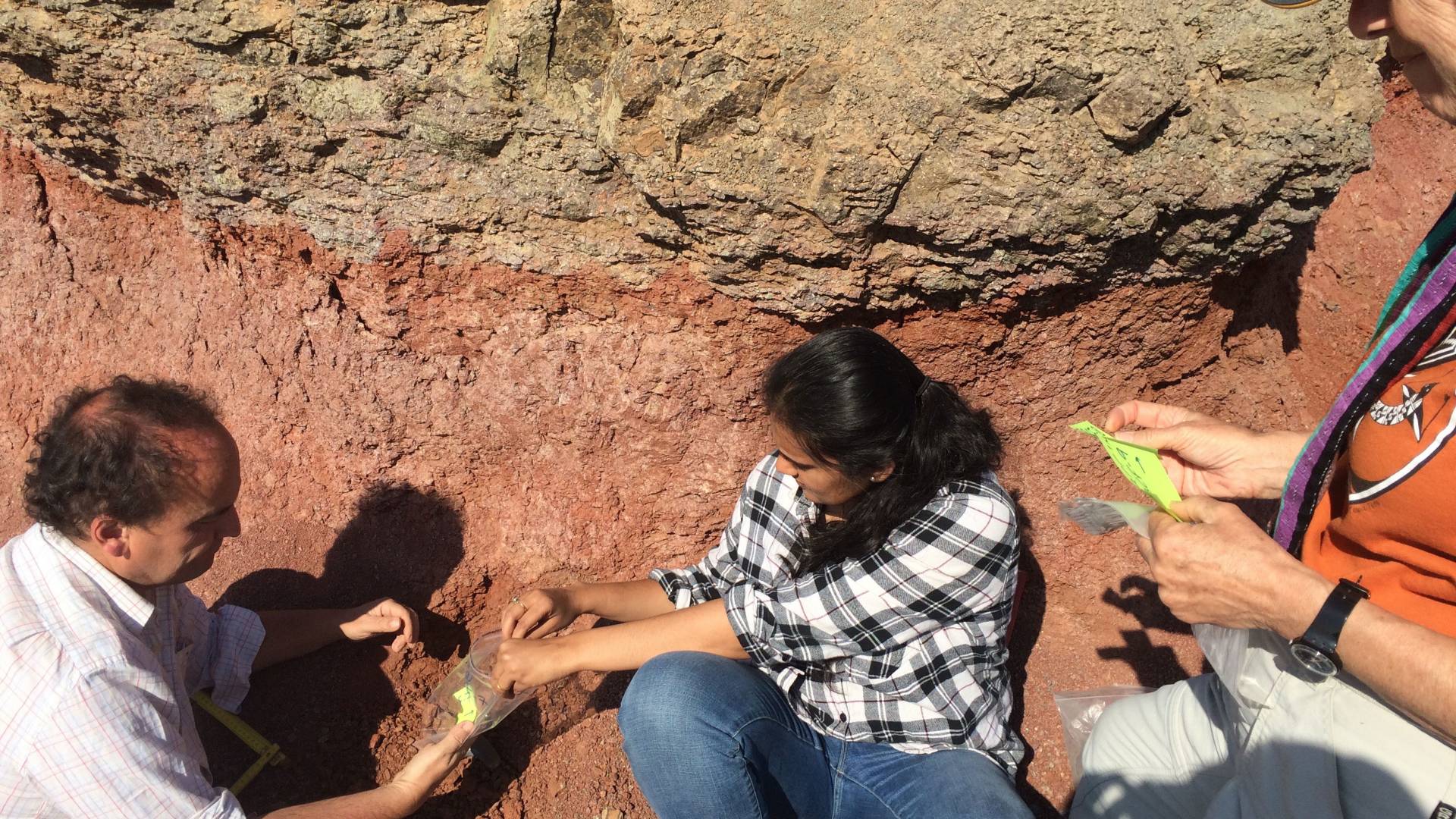 Jahnavi Punekar putting samples into bag