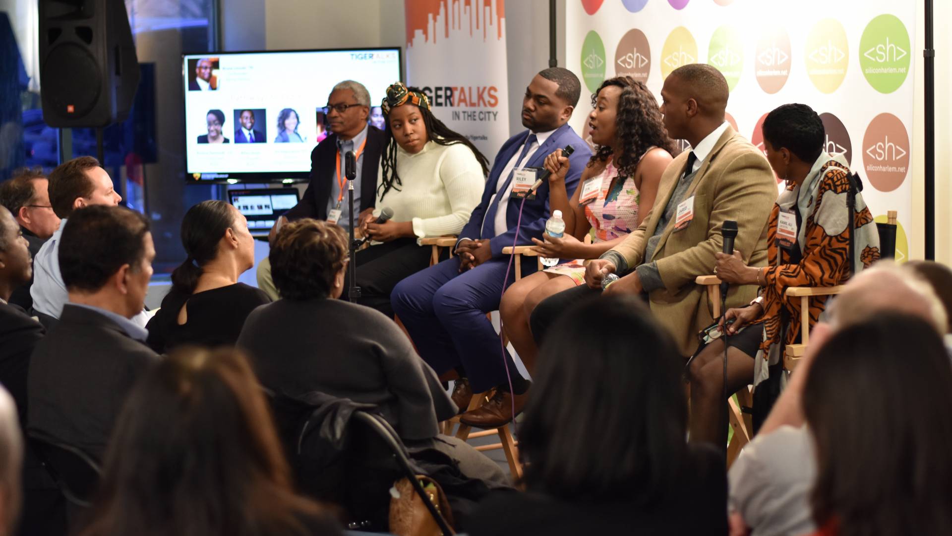 Entrepreneurs speak on a panel about their experiences