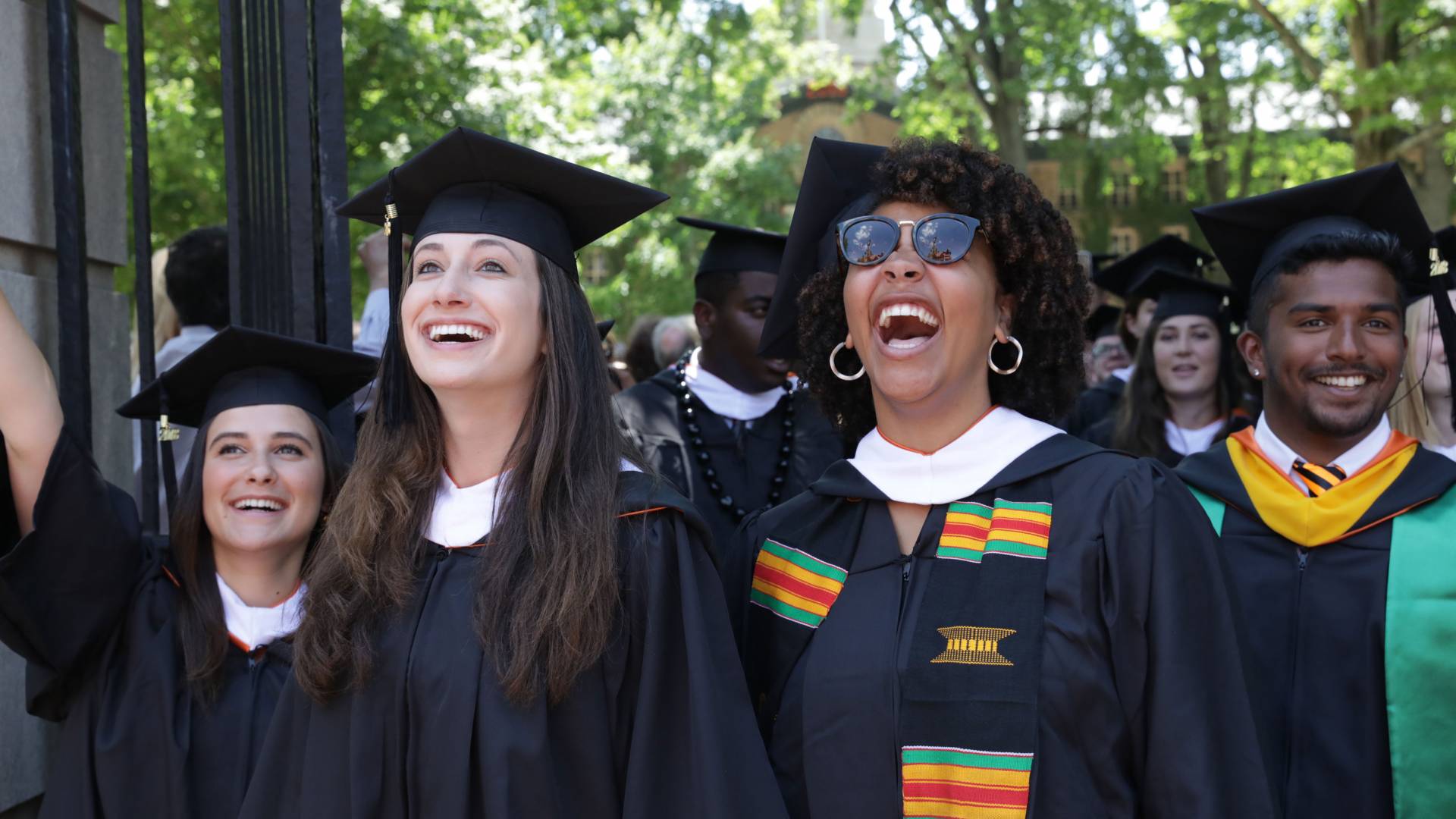 Joyful 2018 graduates stream out of Fitzrandolph Gate