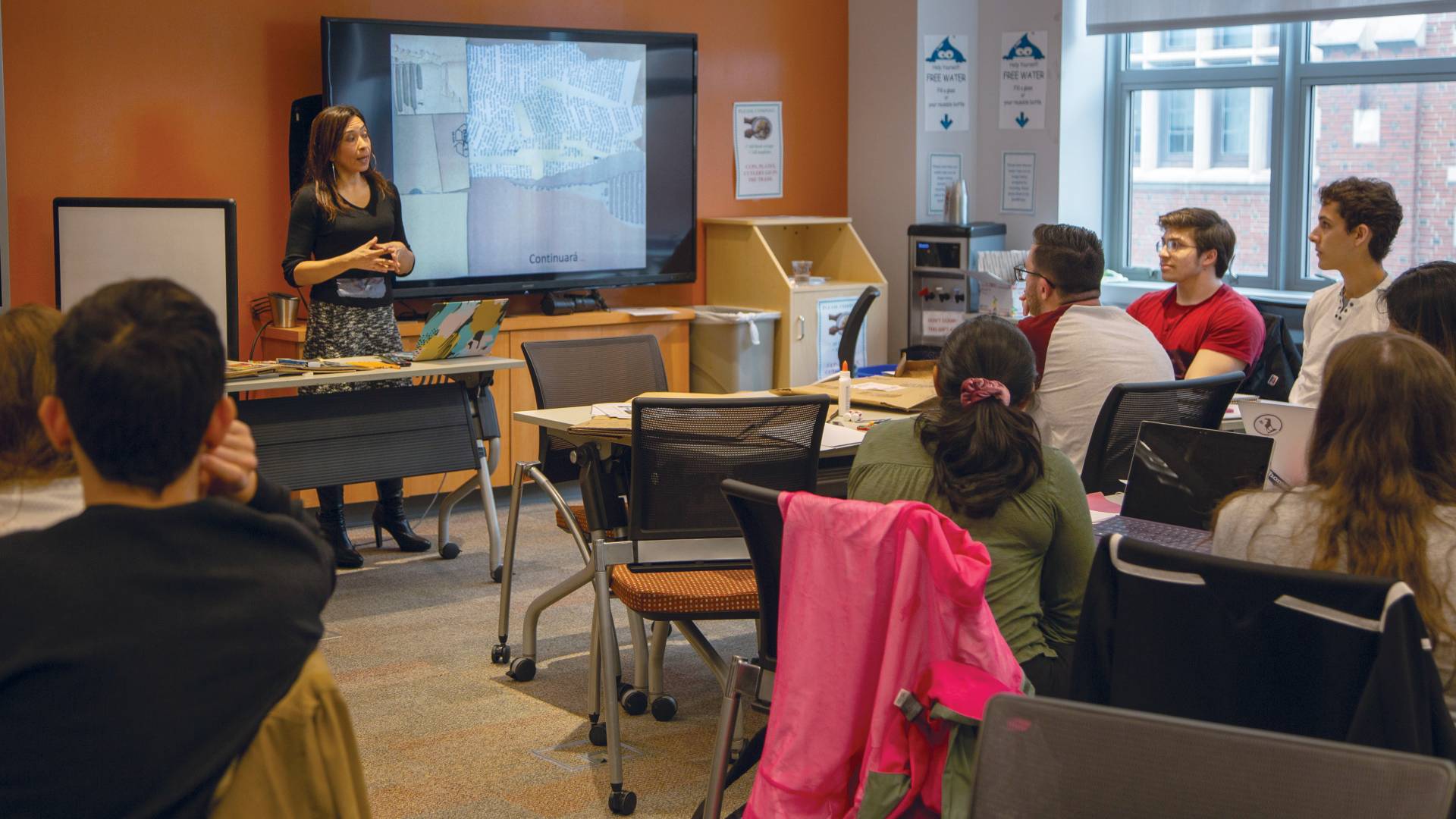 Instructor showing visual aids during lecture