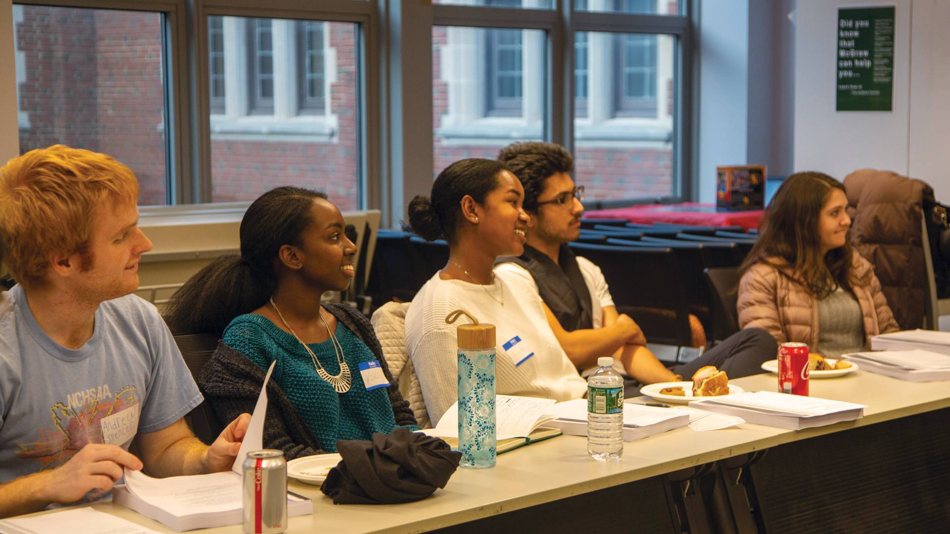 A row of students in a clasroom