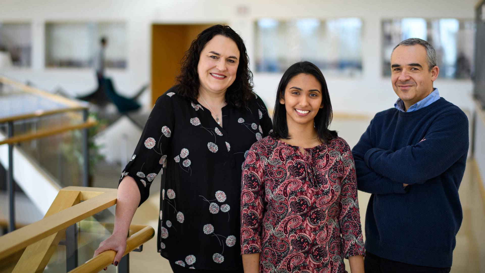 Rebecca Burdine, Aleena Patel, and Stanislav Shvartsman in a laboratory