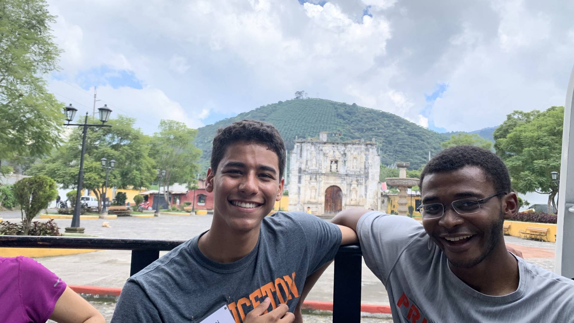 Two students in front of the church