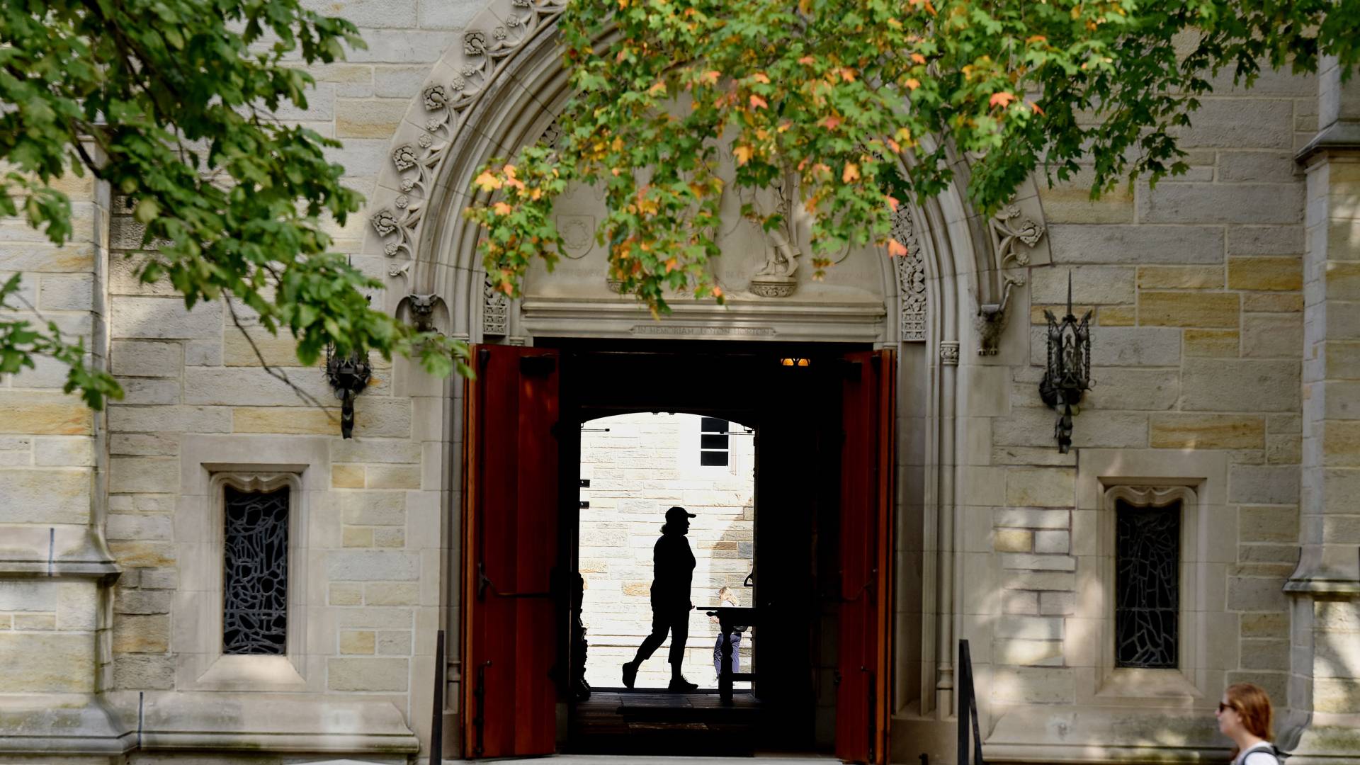 A woman's shadow in an archway