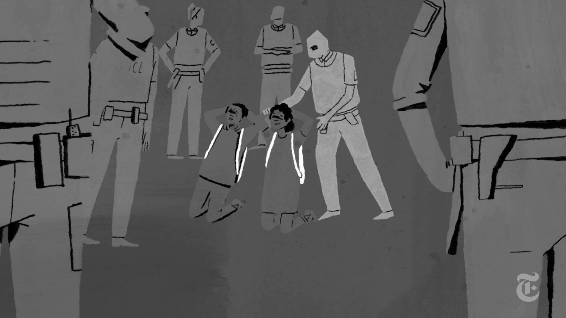 Two children kneel, surrounded by Chicago police