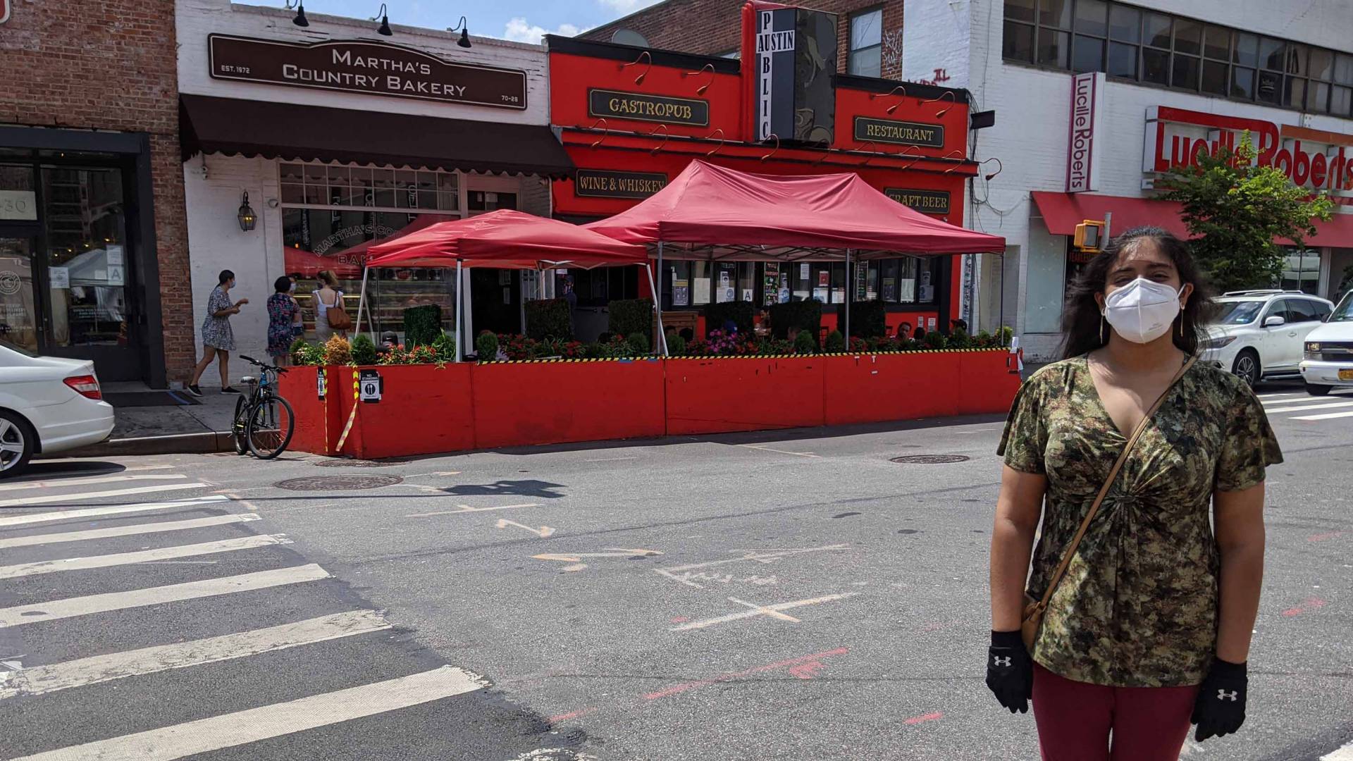 Princeton alumna Anupama Pattabiraman in front of Forest Hills eateries