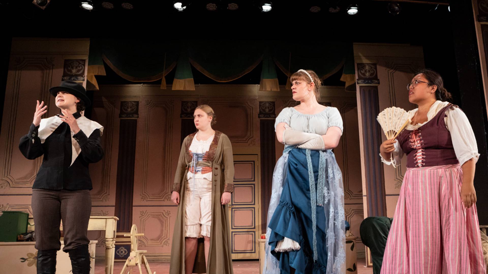 Four actors on stage