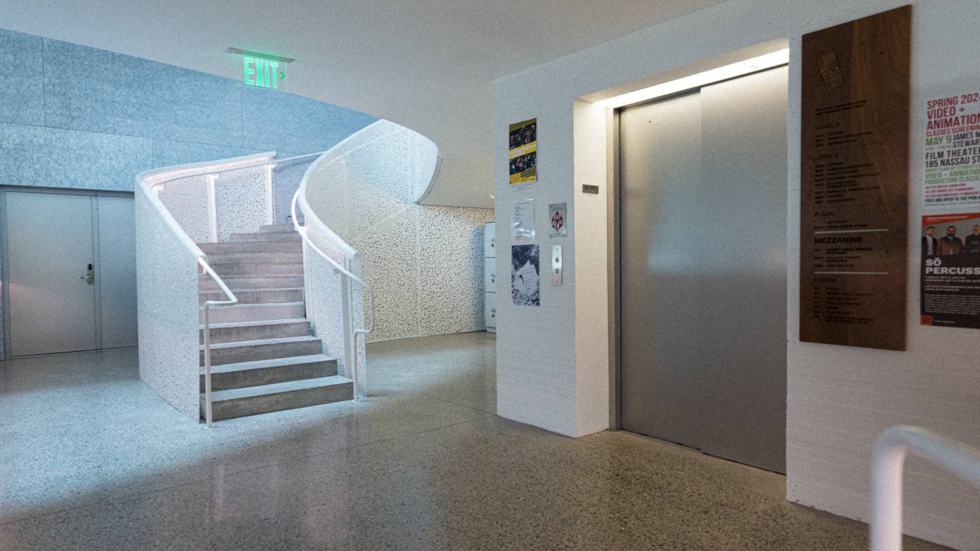 Interior spiral stairs, a few steps away from an elevator