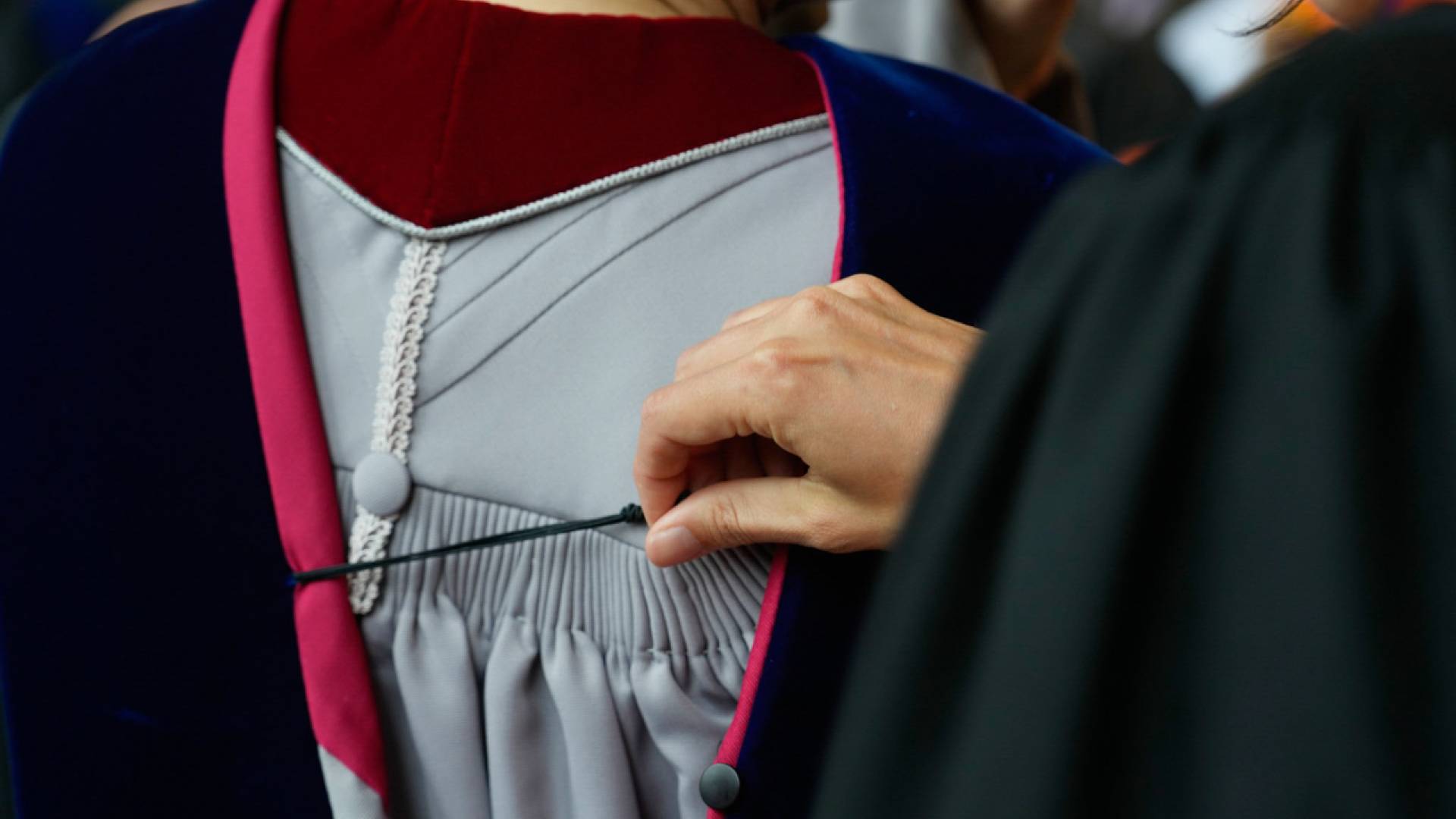The gowns and hoods of academic regalia trace their history to medieval Europe, when heavy woolen robes were necessary in universities' cold, stone halls. 