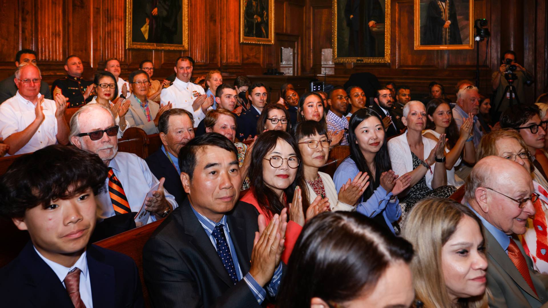Family and friends clapping