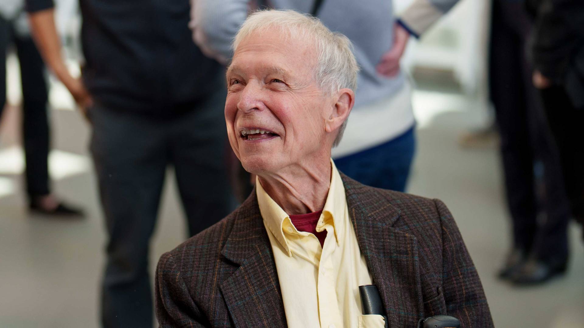 An ebullient John Hopfield talks to well-wishers