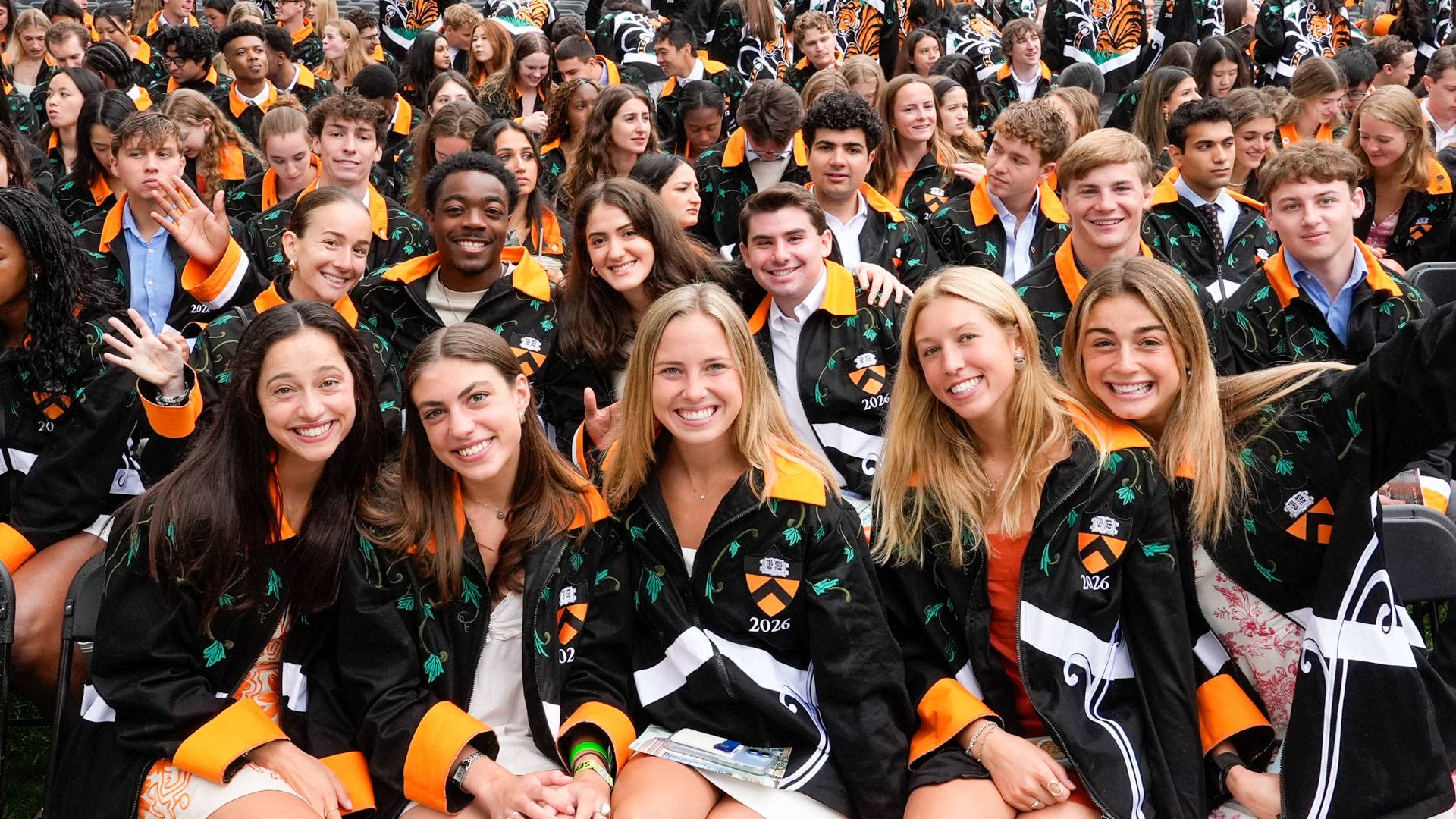 Members of Princeton's graduating Class of 2026 smile on Class Day