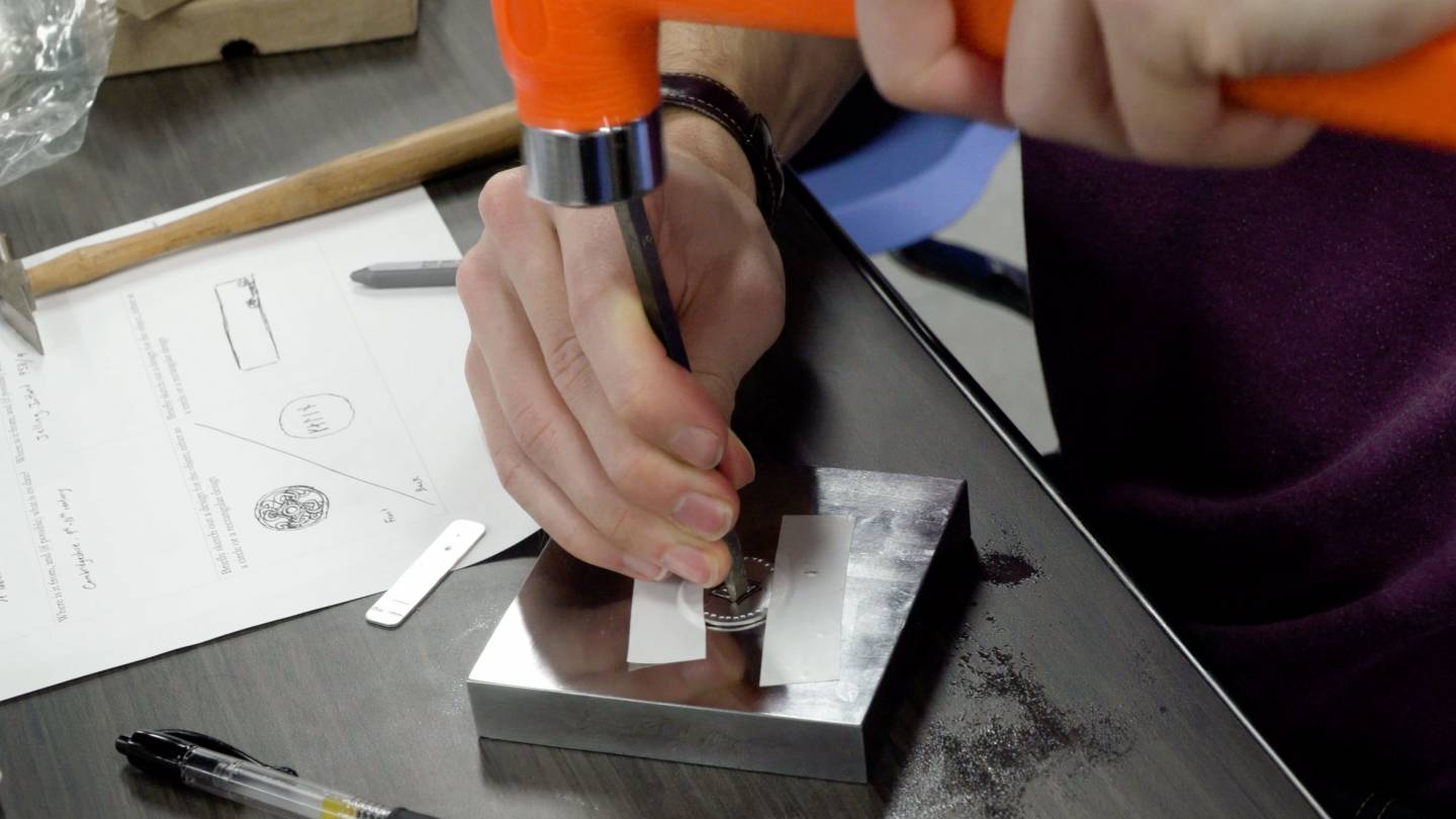 Galen Mayhew making Viking-inspired jewelry