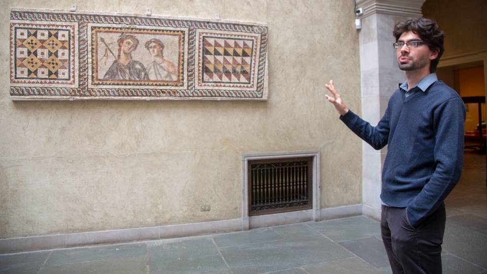 Student talking about mosaic at Worcester Museum of Art