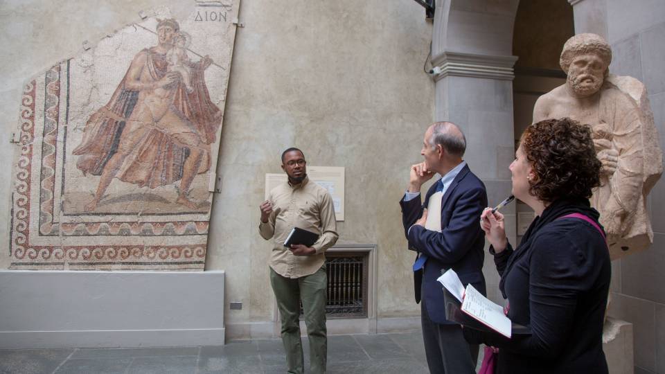 Student discussing mosaic with faculty at Worcester Museum of Art