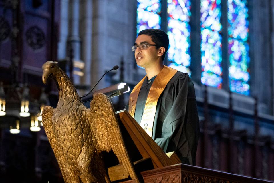 Rishiprotim Nag speaking at podium