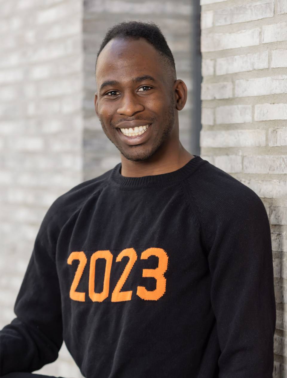 Jovan wearing 2023 sweatshirt