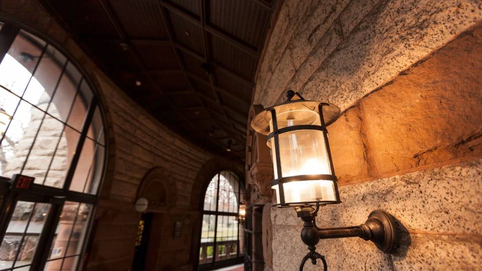 Photo of a light on the wall in Alexander Hall