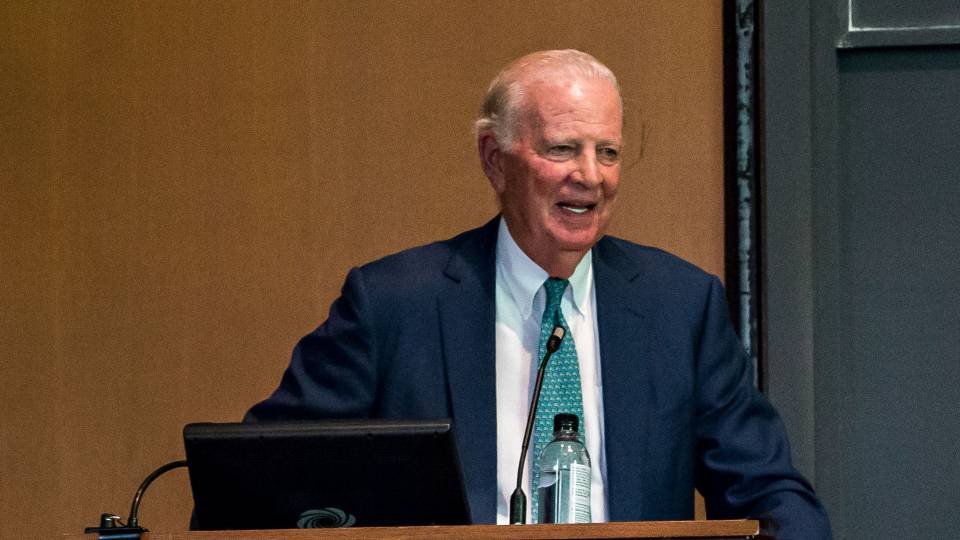 James Baker at podium giving Taplin lecture