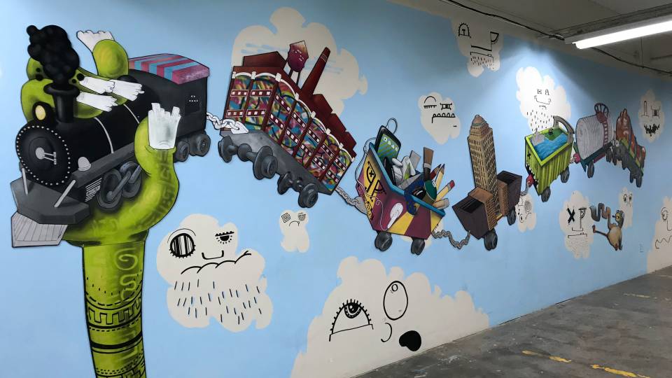 Painted mural of trains on wall of Journey's End