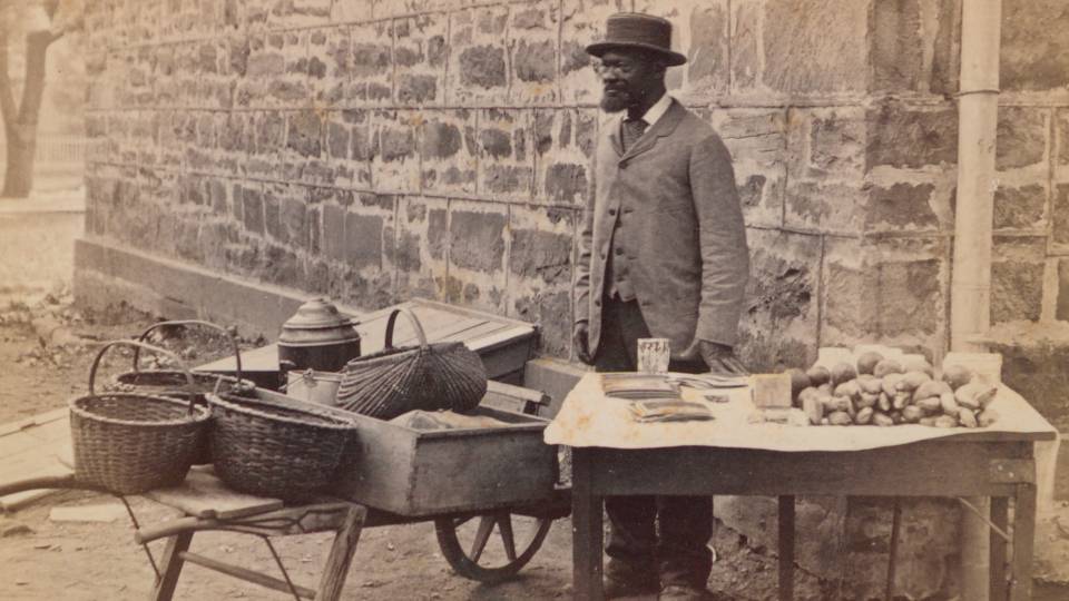 Jimmy Johnson selling fruits in front of Nassau Hall in 1881