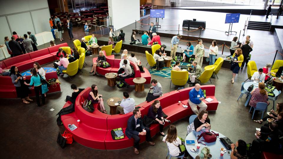 Thrive Arts Conference attendees in the Forum at the Lewis Arts complex
