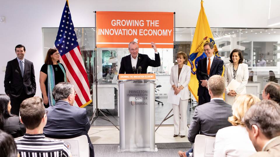 NJ Governor speaking at press conference at Princeton BioLabs