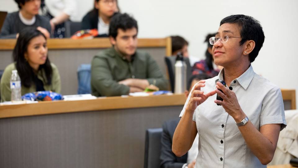 Maria Ressa speaking to a classroom of students