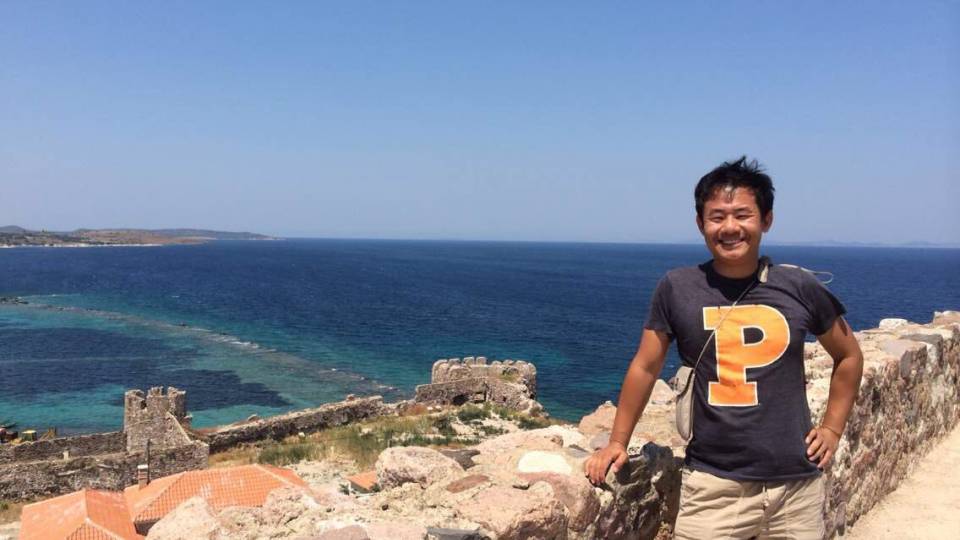 File picture of Xiyue Wang standing along a waterfront.