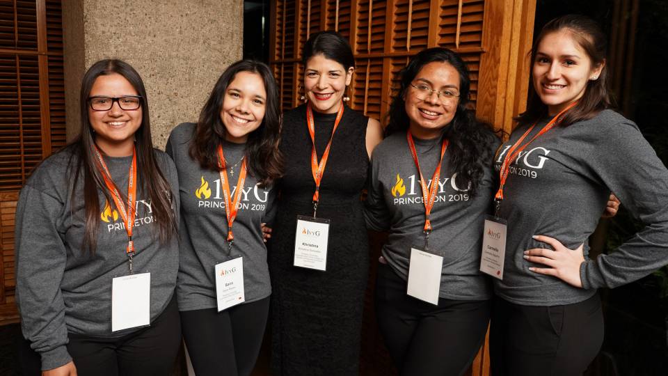 Khristina Gonzalez poses with conference attendees