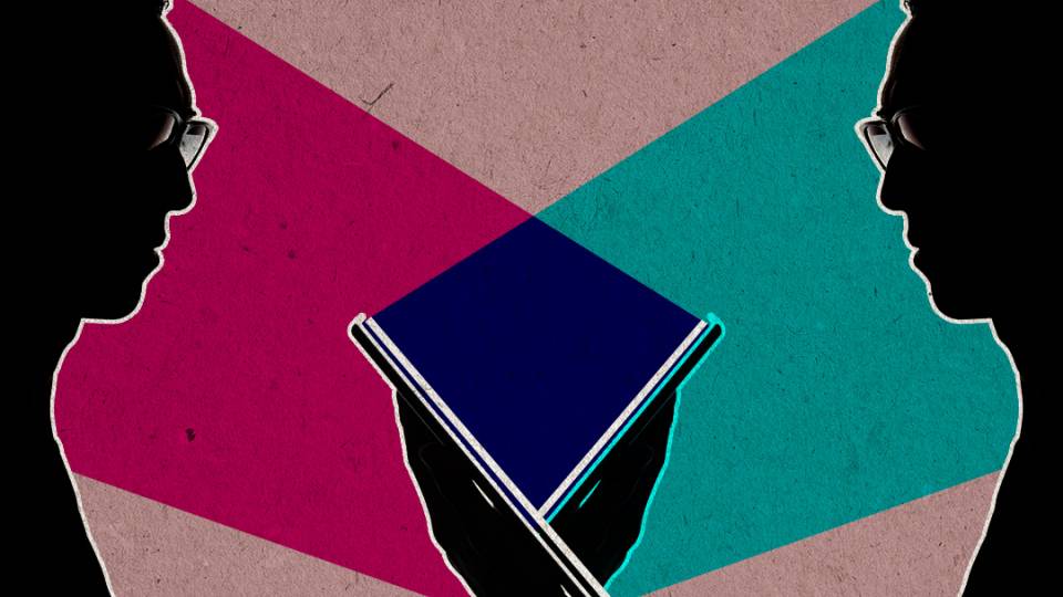 Two figures wearing glasses in the beam of their devices