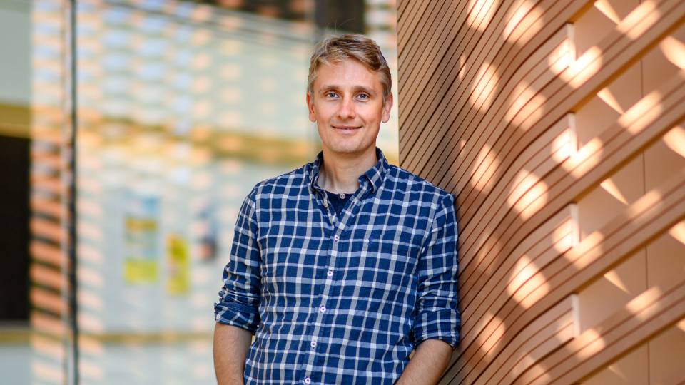 AJ te Velthuis in front of the Icahn building