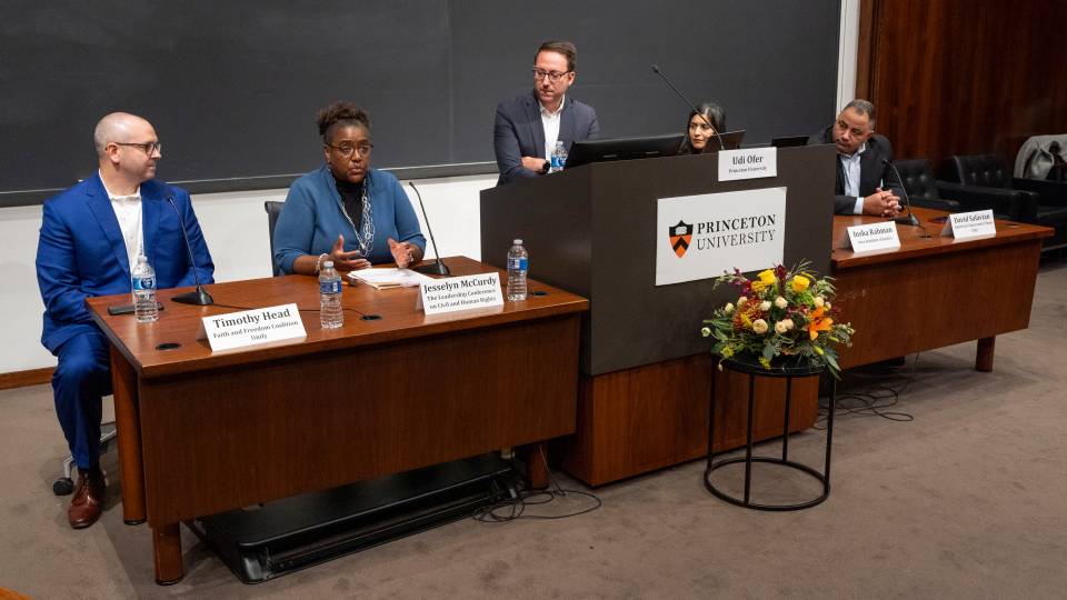 A panel discussion at Princeton SPIA featuring representatives from organizations across the aisle, with Professor Udi Ofer at the center podium
