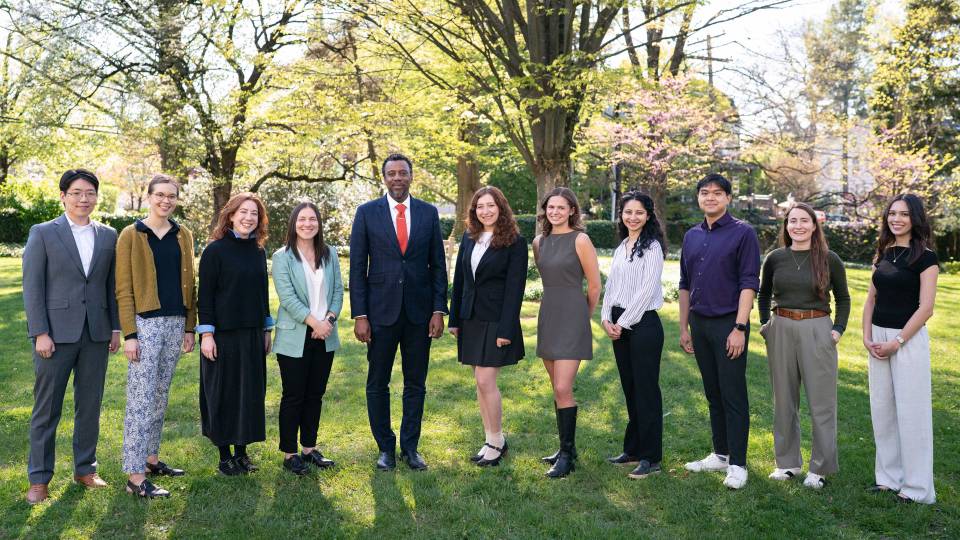 Graduate School Dean Rodney Priestley poses with the honorees.