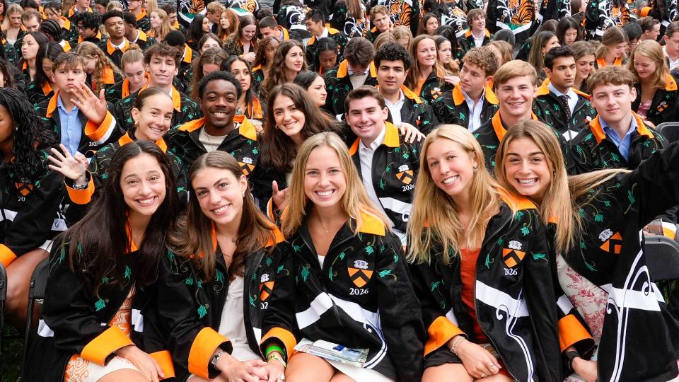 Members of Princeton's graduating Class of 2026 smile on Class Day