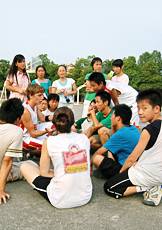 Rory Truex and Betty Cox with students