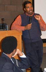 Angel Harris addresses students at a workshop preceding the symposium.