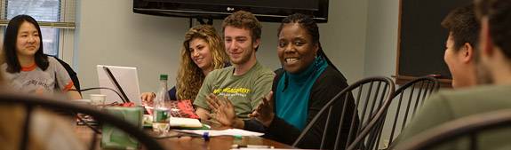 Rooks talking with students in seminar