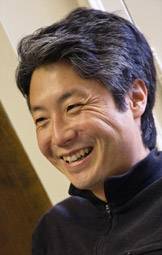 Lee laughing with students