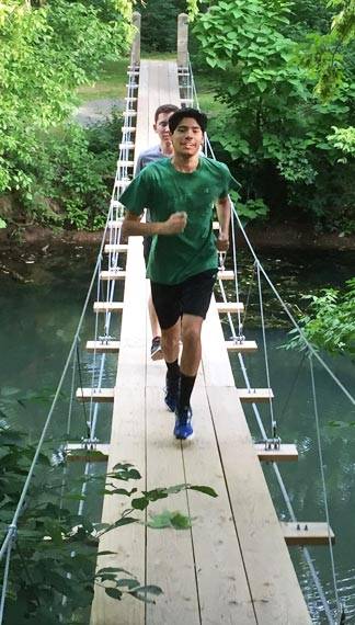Freshman Scholars Institute (FSI) running on Institute for Advanced Studies bridge
