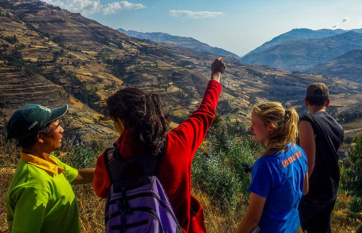 Engineers Without Borders students: In the summer of 2015, a team of EWB students visited the town of Pusunchás, Peru, to discuss the layout of a potential water system. From left, the president of the Pusunchás Water Committee talks with Kasturi Shah, Class of 2016, and Corrie Kavanaugh and Will Guiracoche, Class of 2017.